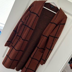 Long, cozy, rustic colored cardigan.